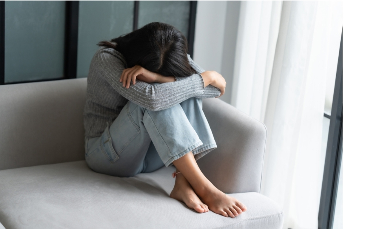 Young woman seeking psychiatry consultations care in Houston, TX for severe anxiety and emotional distress symptoms.
