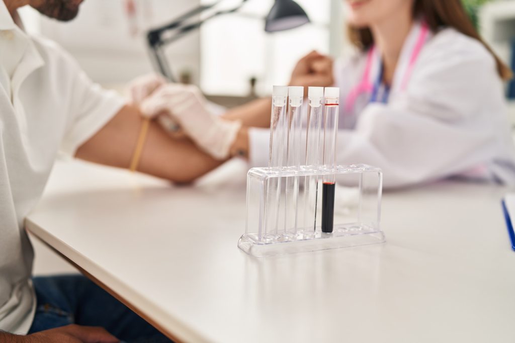 Patient undergoing blood analysis at a medical clinic for discounted & low-cost lab tests in Houston area