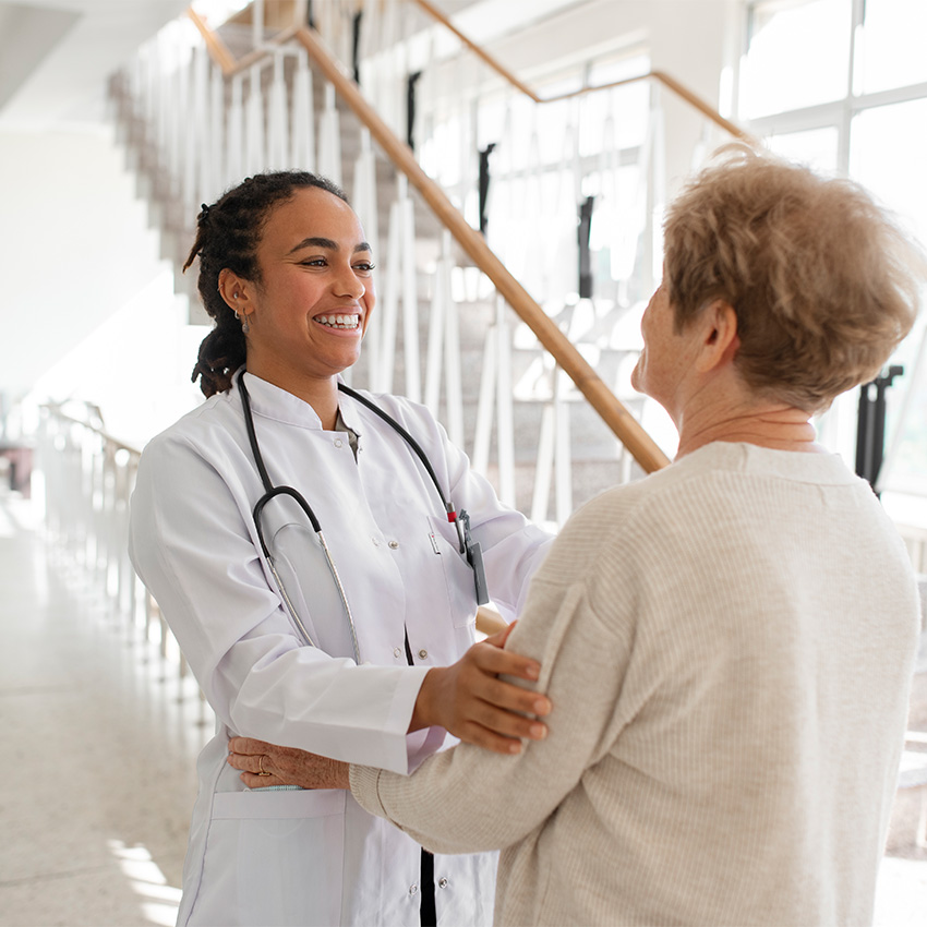 Professional doctor checking patient vitals for reliable Annual & Work Physicals Houston TX in a local clinic.